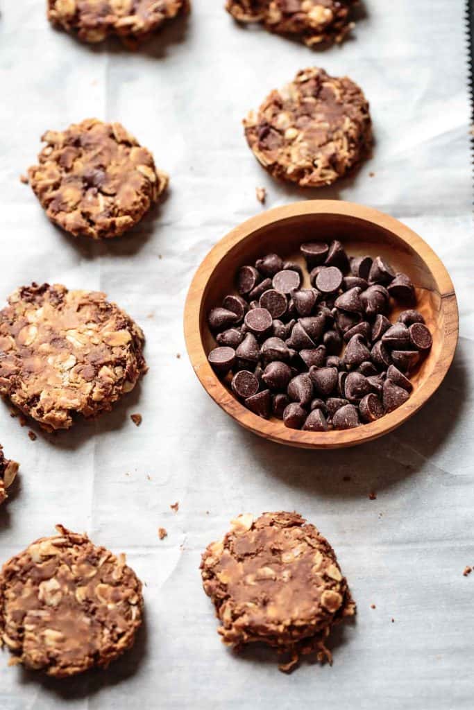 no bake oatmeal chocolate chip cookies with a bowl of chocolate chips