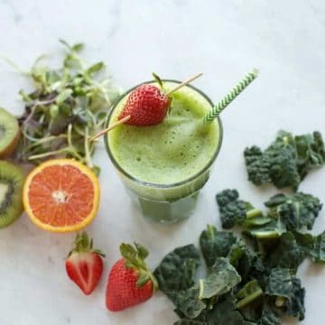 one green smoothie with strawberry and kale