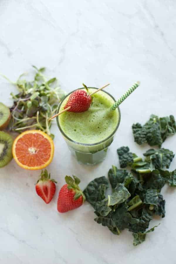 one green smoothie with strawberry and kale