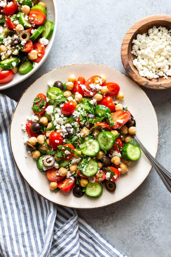 mediterranean chickpea salad on two white plates