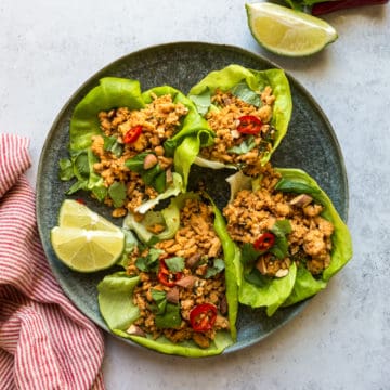 Thai Basil Chicken Lettuce Wraps on a plate.