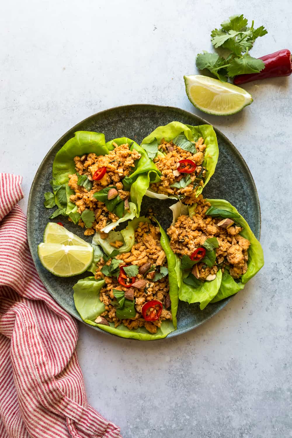 Thai Basil Chicken Lettuce Wraps on a plate.