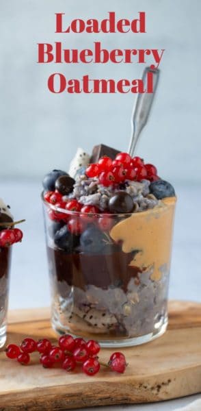 Loaded blueberry oatmeal with chocolate and berries. This delicious dish is packed with juicy blueberries and topped with indulgent chunks of dark chocolate, creating a delightful combination of flavors. The addition