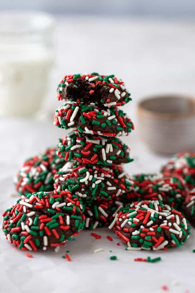 chocolate sprinkle cookies stacked up high