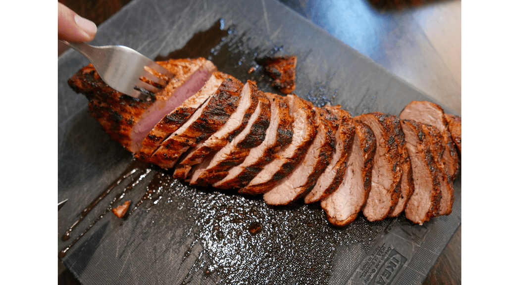 baked pork tenderloin sliced