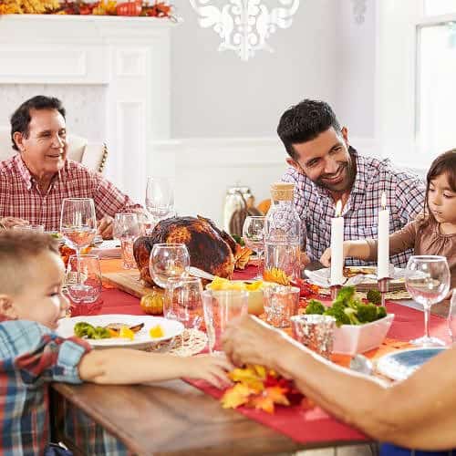 family eating thanksgiving meal
