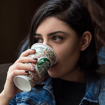 woman drinking starbucks