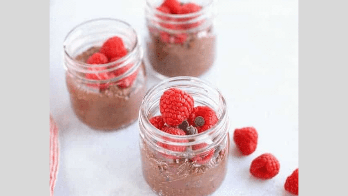 chocolate chia pudding topped with raspberries