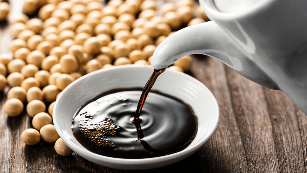Soy sauce being poured into a bowl