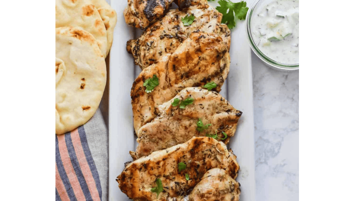 Grilled Chicken Souvlaki on a white plate.