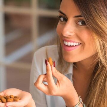 woman eating almonds