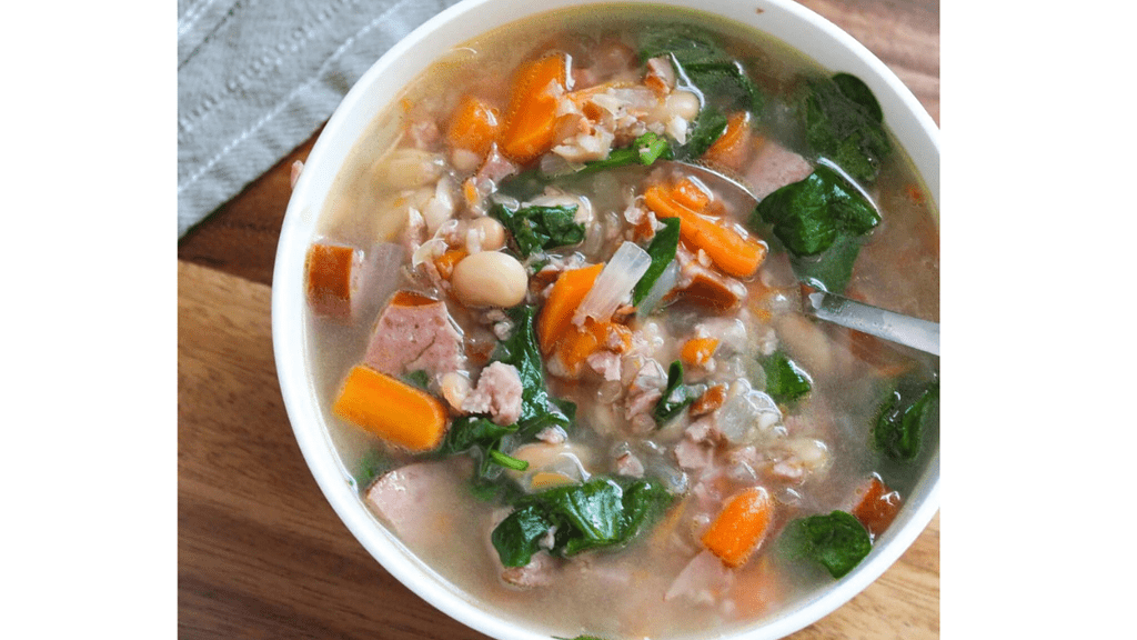 sausage and white bean soup in a bowl