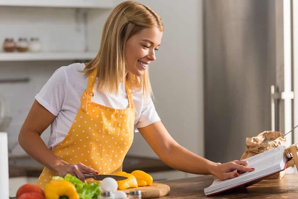woman with cookbook