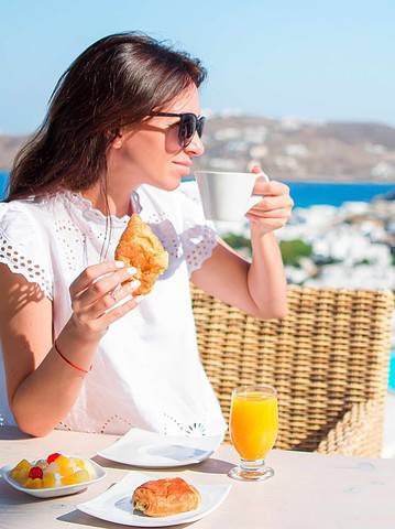 woman eating in the mediterranean