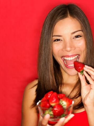 woman eating fruit