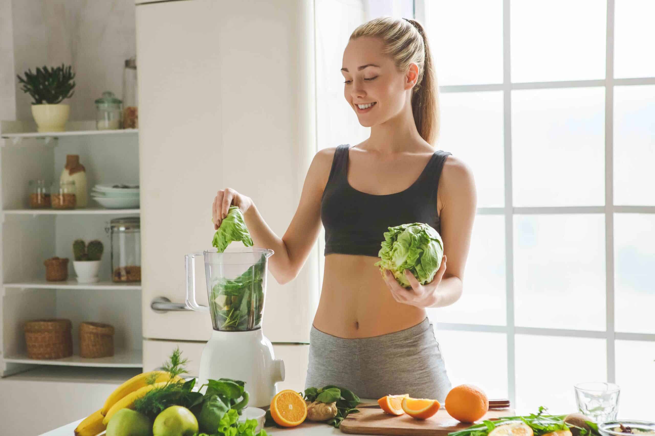 woman with a green smoothie