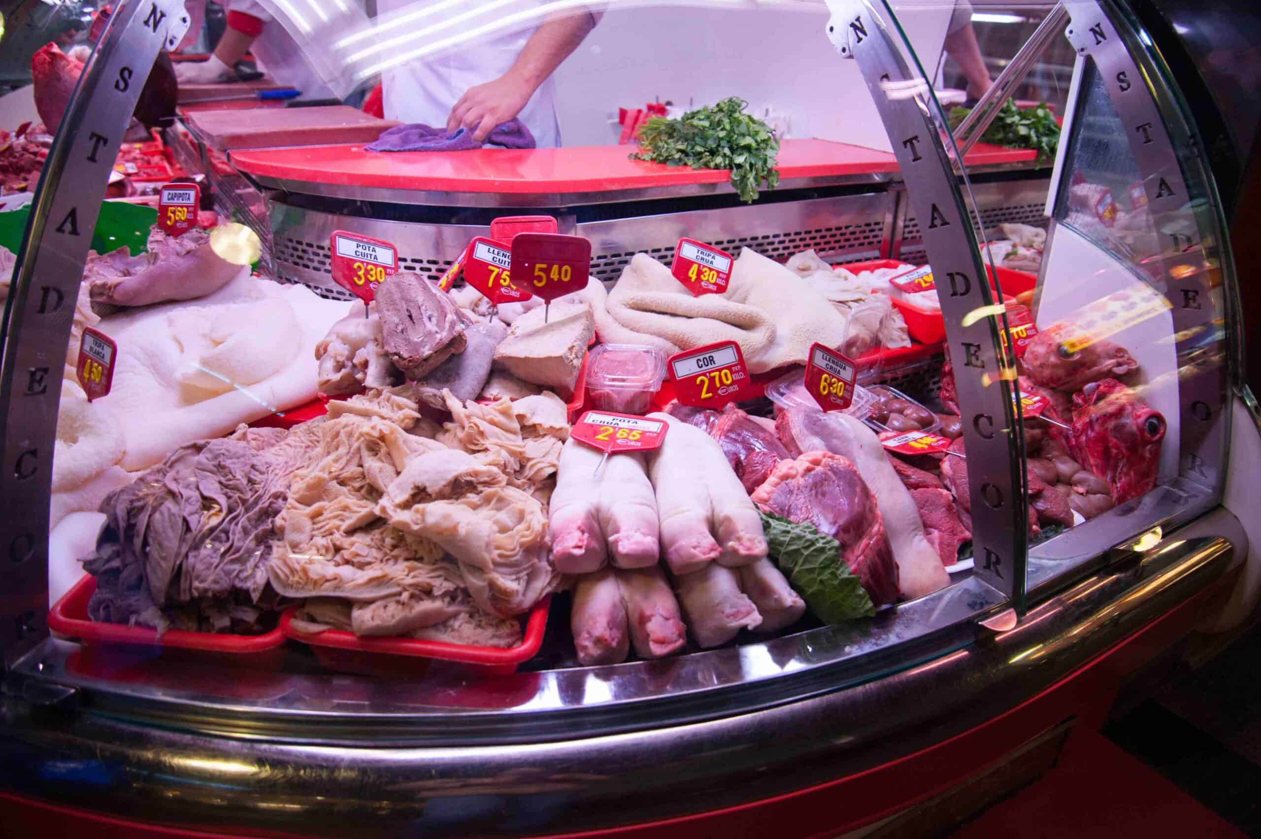 Stand with meat offal in meat market