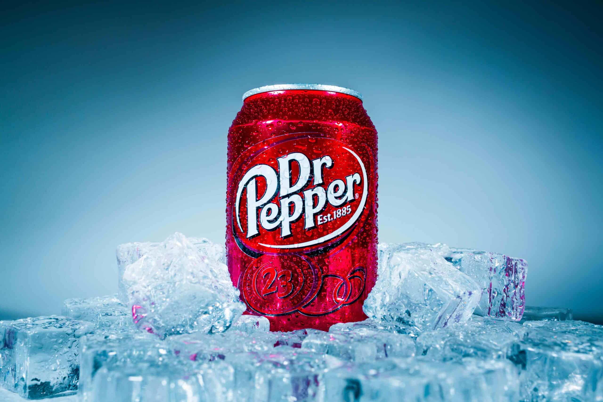  Can of Dr Pepper soft drink on ice. Dr Pepper is a soft drink marketed as having a unique flavor. The drink was created in the 1880s.