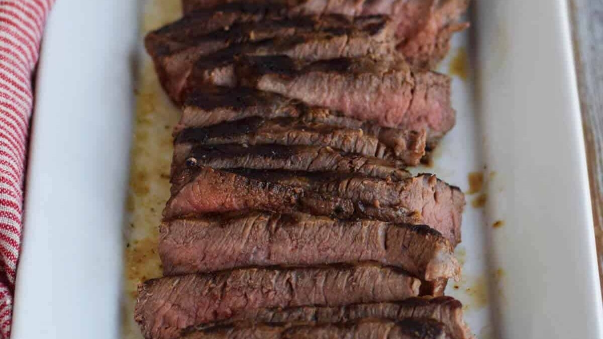 London broil on a white tray.