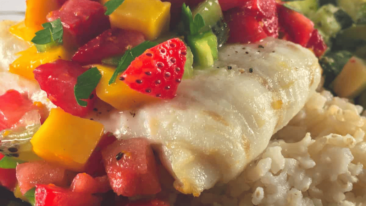 Cod topped with strawberry salsa.