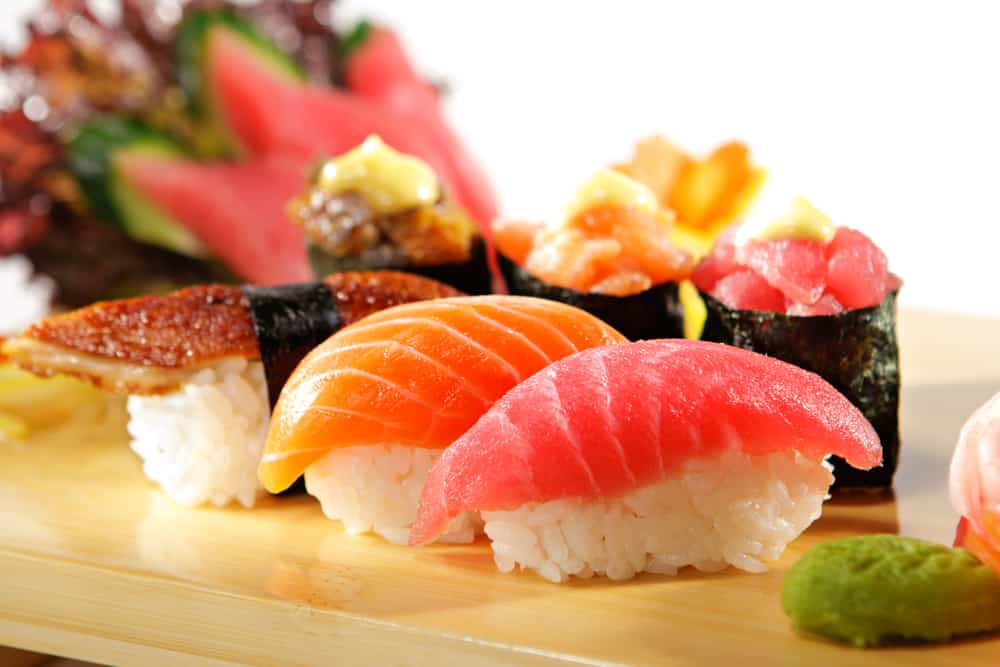 Japanese Cuisine - Sushi Set: Salmon, Conger and Tuna Sushi with Salad Leaf