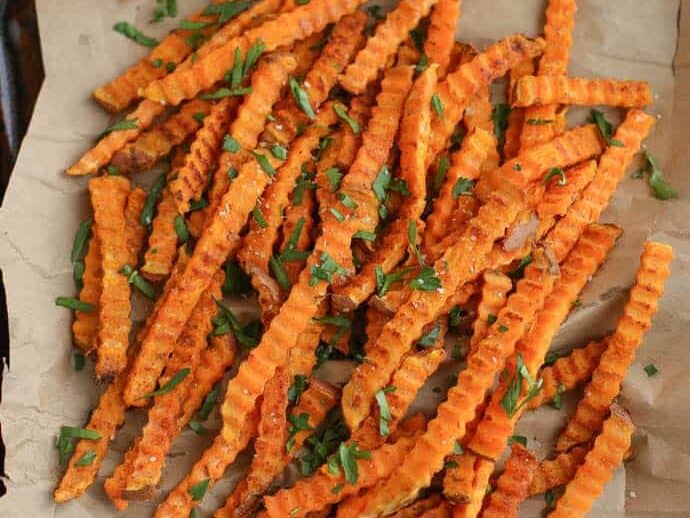 Oven Roasted Spiced Sweet Potato Fries on a sheet pan