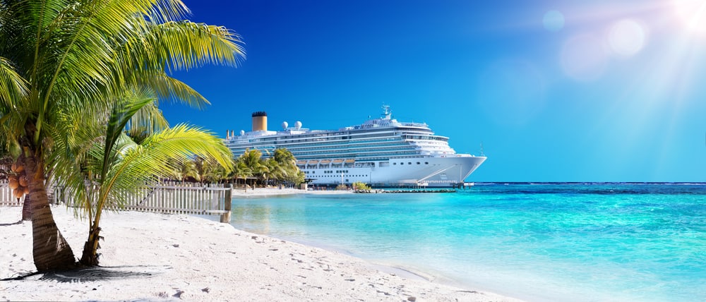 Cruise,To,Caribbean,With,Palm,Tree,On,Coral,Beach