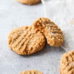 40 gluten-free cookies with a bite taken out of them.
