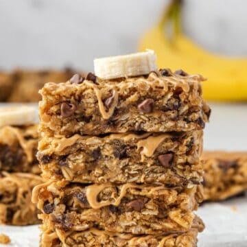 A stack of delicious and nutritious chocolate chip banana oat bars, perfect for a quick and healthy snack.