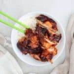 30 Air Fryer Chicken Recipes served with chopsticks and rice.