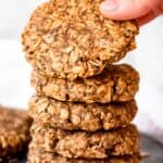 A stack of healthy oat cookies on a plate.