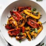 46 gluten-free appetizers featuring roasted peppers in a white bowl.
