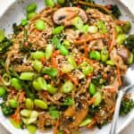 A bowl of 50 easy gluten-free Asian noodles with vegetables and mushrooms.