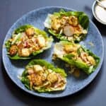 Healthy tofu lettuce wraps on a plate.