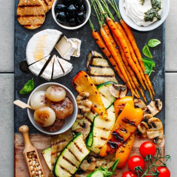 46 Gluten Free Appetizers: Grilled vegetables and cheese on a cutting board.
