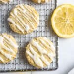 40 Lemon Gluten Free Cookies with Icing on a Cooling Rack.