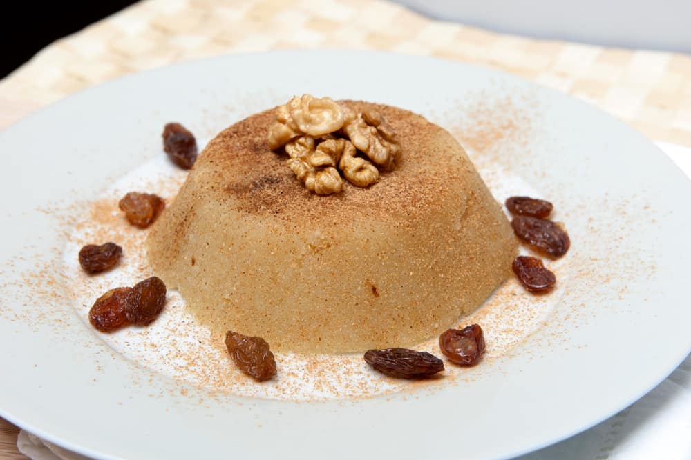 semolina halva, halvah, halava sweet desert with raisiins and nuts