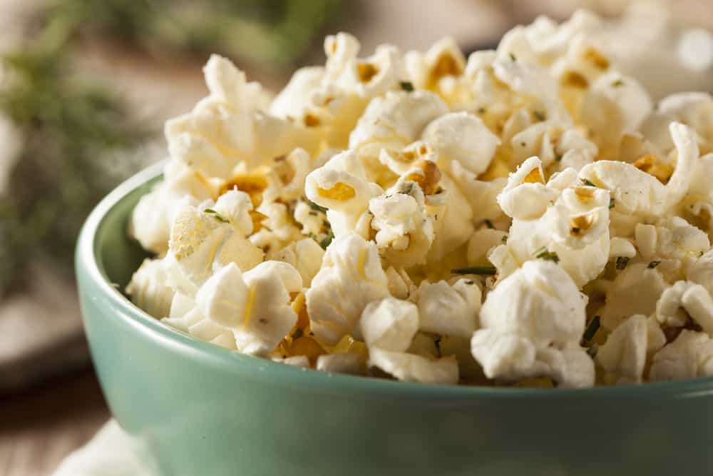 Homemade Rosemary Herb and Cheese Popcorn in a Bowl