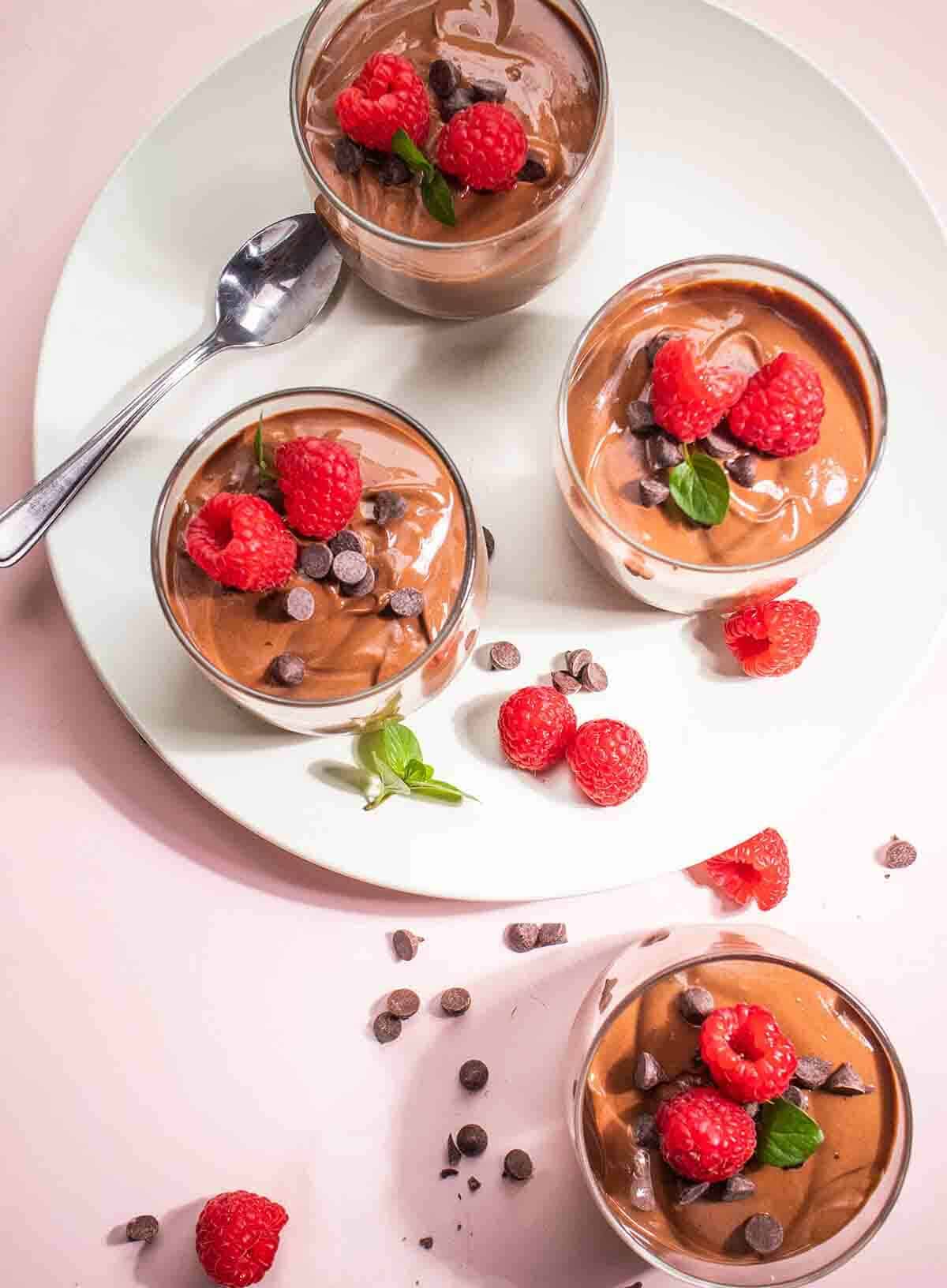 Easy gluten-free chocolate mousse with raspberries and chocolate chips.