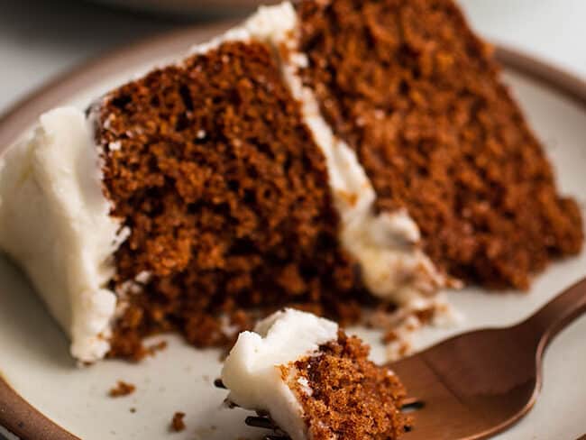 One slice of spice cake on a plate.