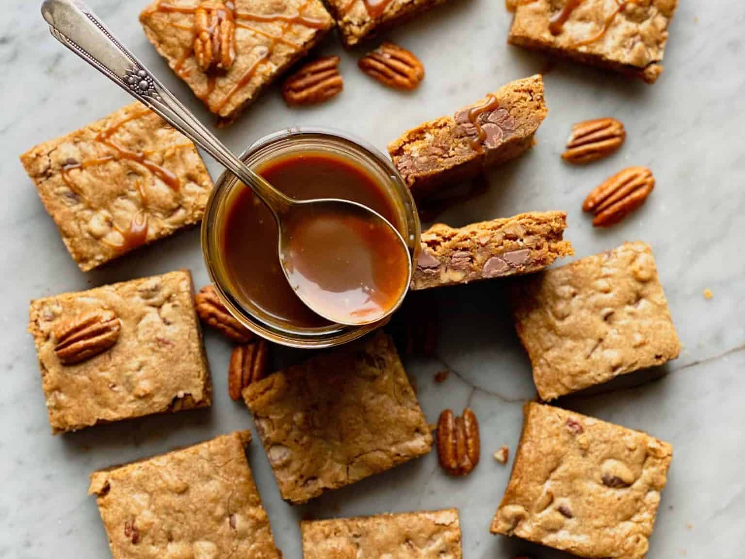 Blondies with a bowl of caramel in the middle.