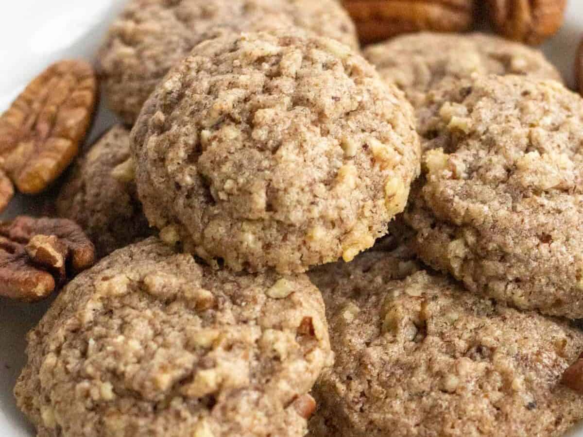 Pecan cookies in a pile.