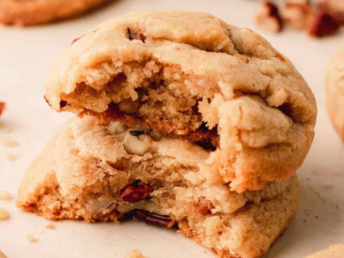 Pecan cookies with bite out.