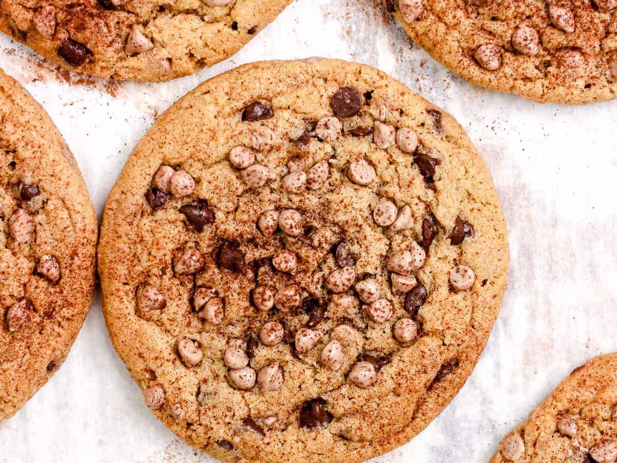 Cinnamon chocolate chip cookies with lots of chocolate chips.