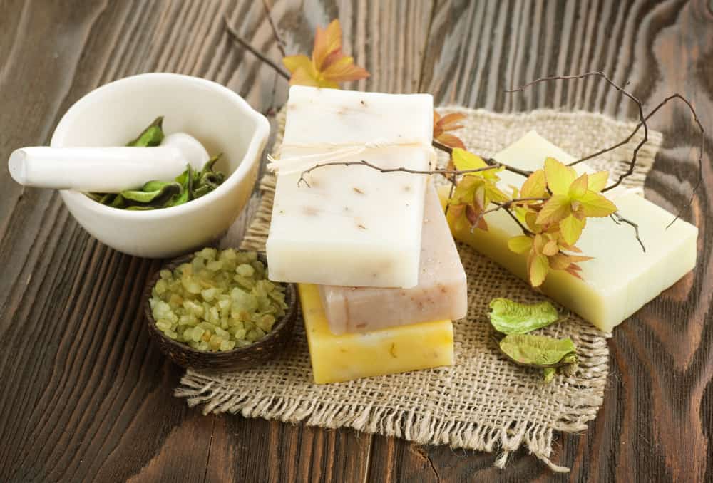 Handmade Soap With Natural Ingredients Over Wooden Background