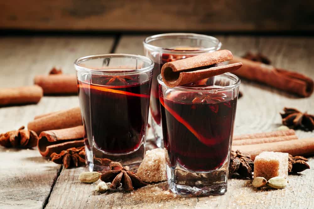hot mulled wine with cinnamon, star anise, orange and bro
