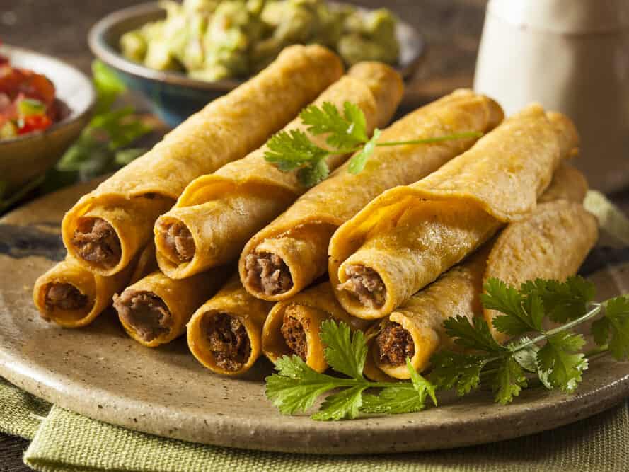 Homemade Mexican Beef Taquitos with Cilantro and Salsa