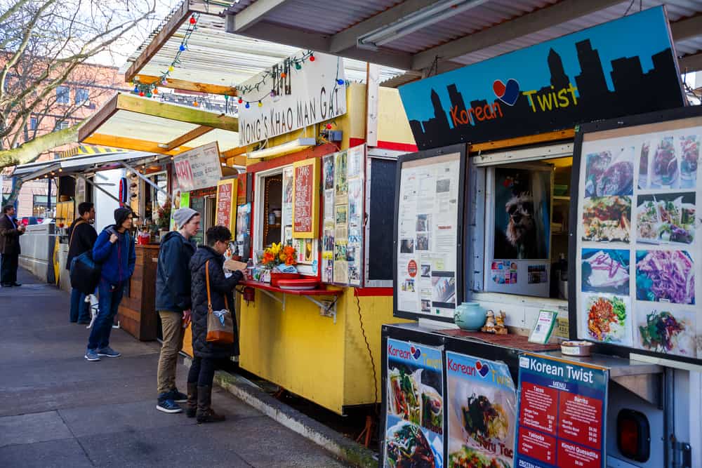 PORTLAND, OR - FEBRUARY 2, 2016: Food trucks and carts in downtown PDX offer lunch and other meails for inexpensive prices near major office buildings.
