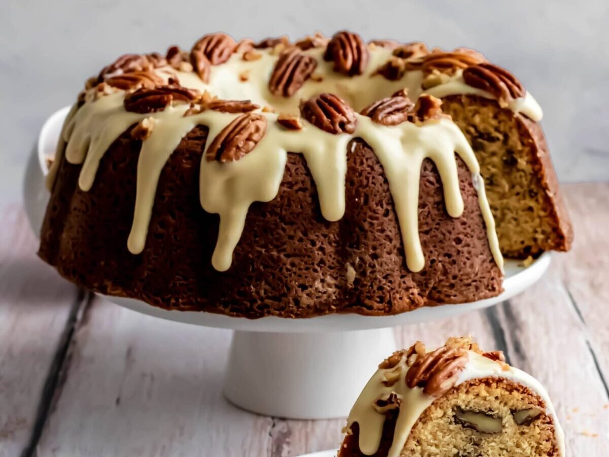 Bundt cake on a white stand.