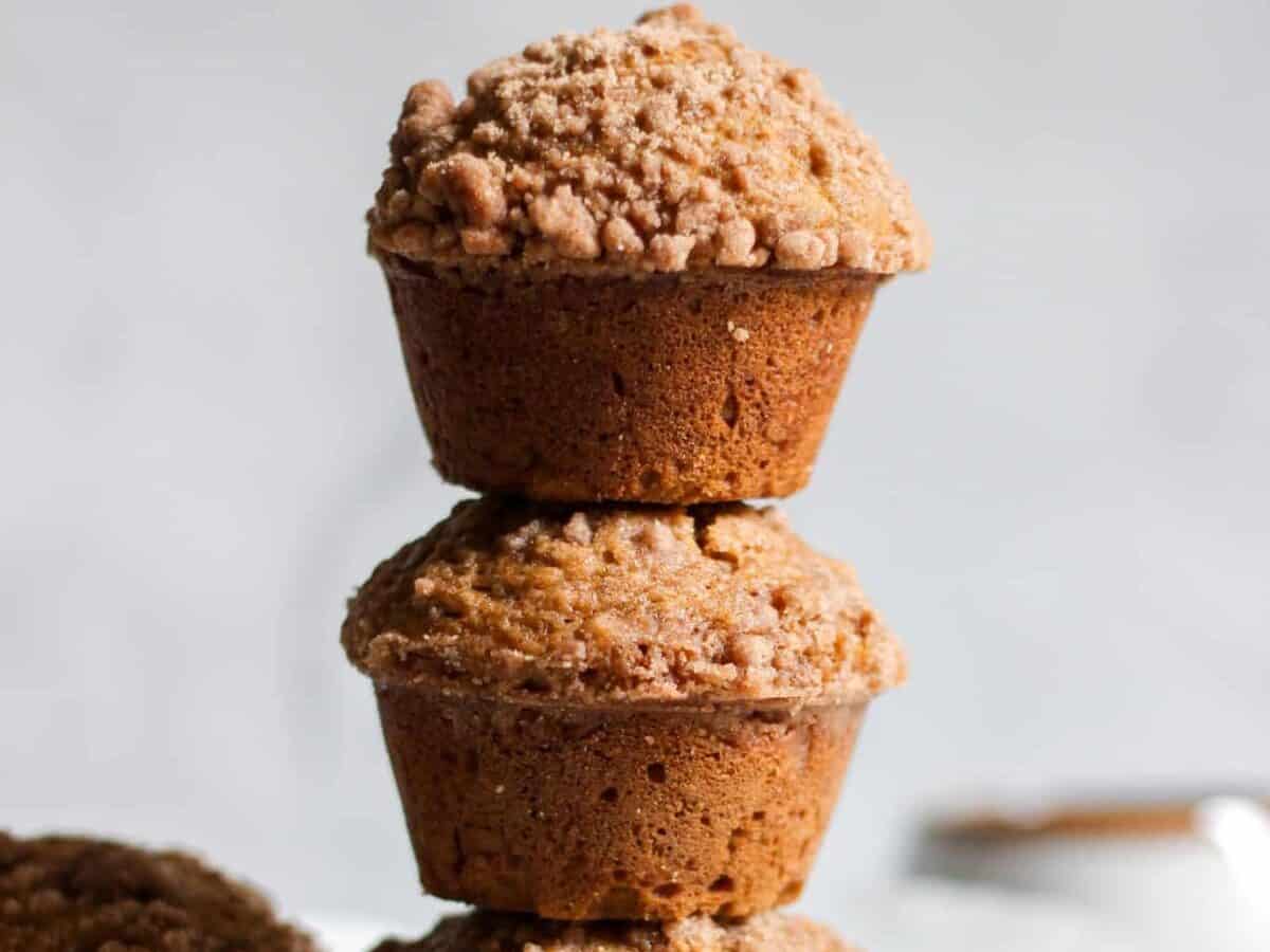 Two pumpkin muffins stacked up. 